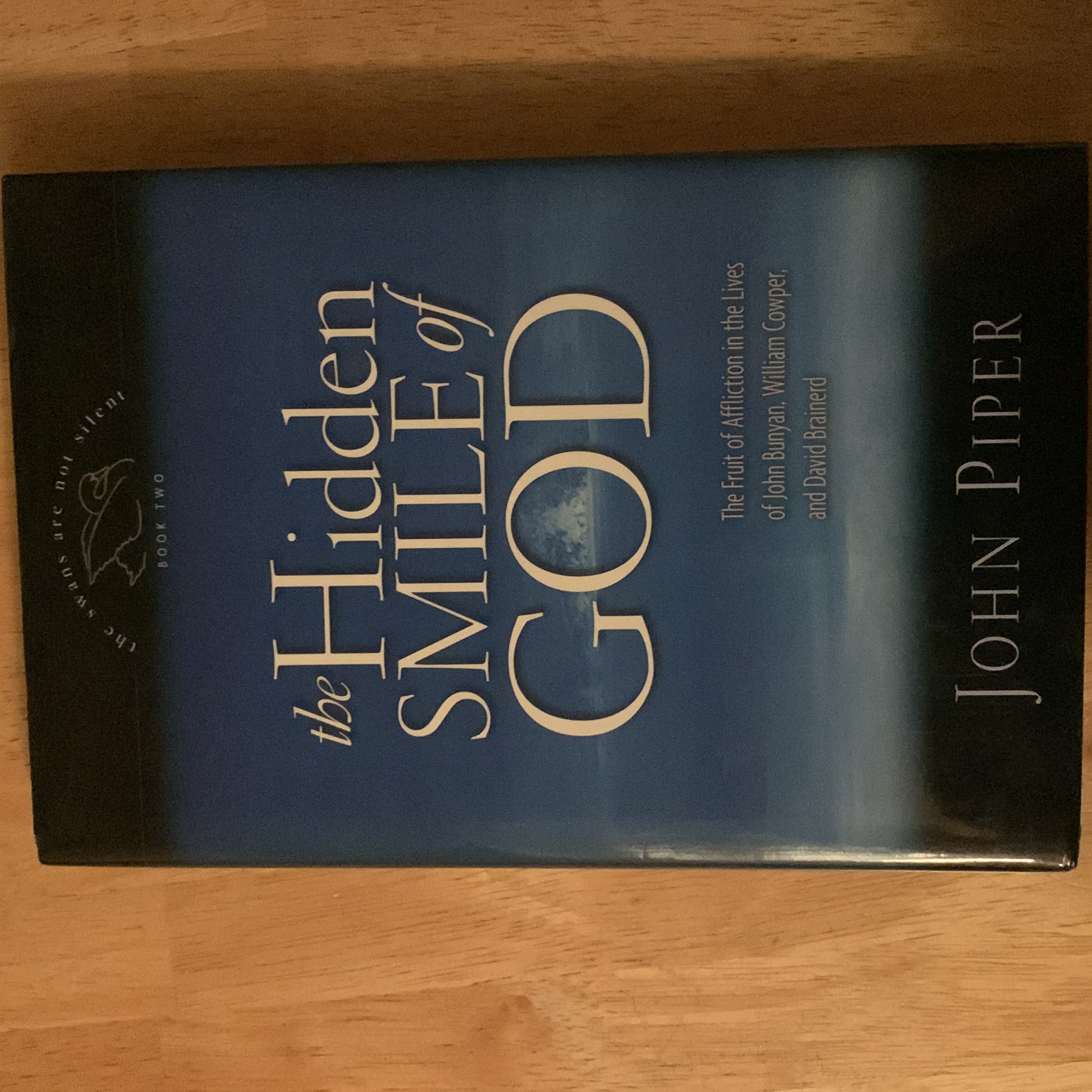 The Hidden Smile of God