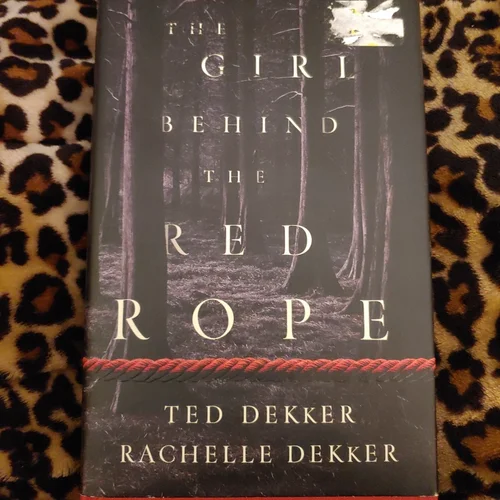 The Girl Behind the Red Rope