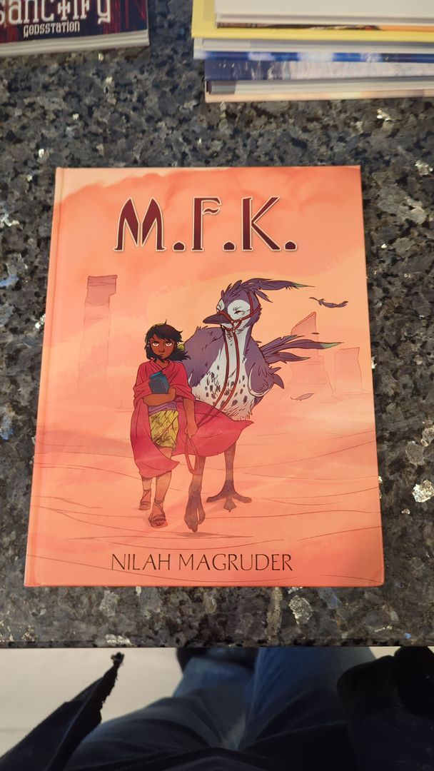 M. F. K.