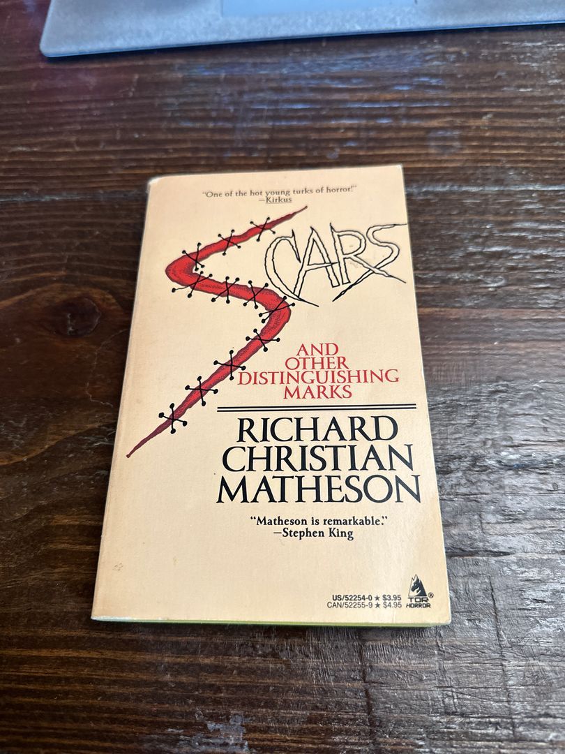 Scars and Other Distinguishing Marks