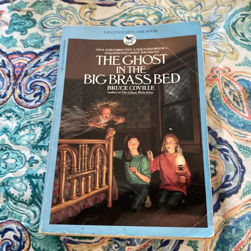 The Ghost in the Big Brass Bed