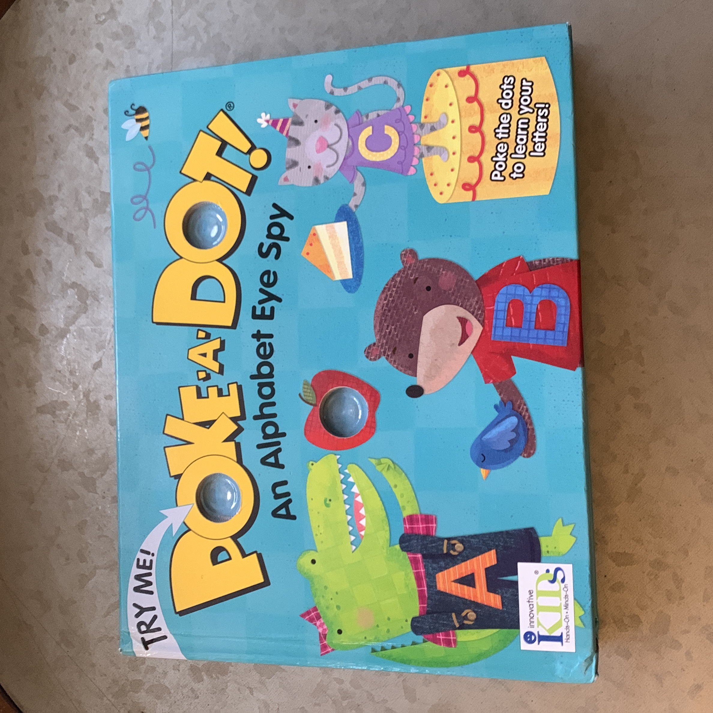 Poke-A-Dot: an Alphabet Eye Spy