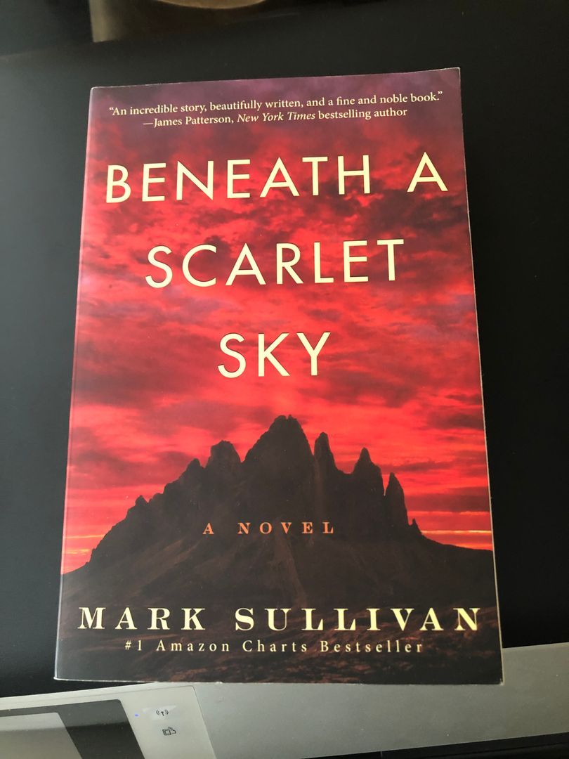 Beneath a Scarlet Sky