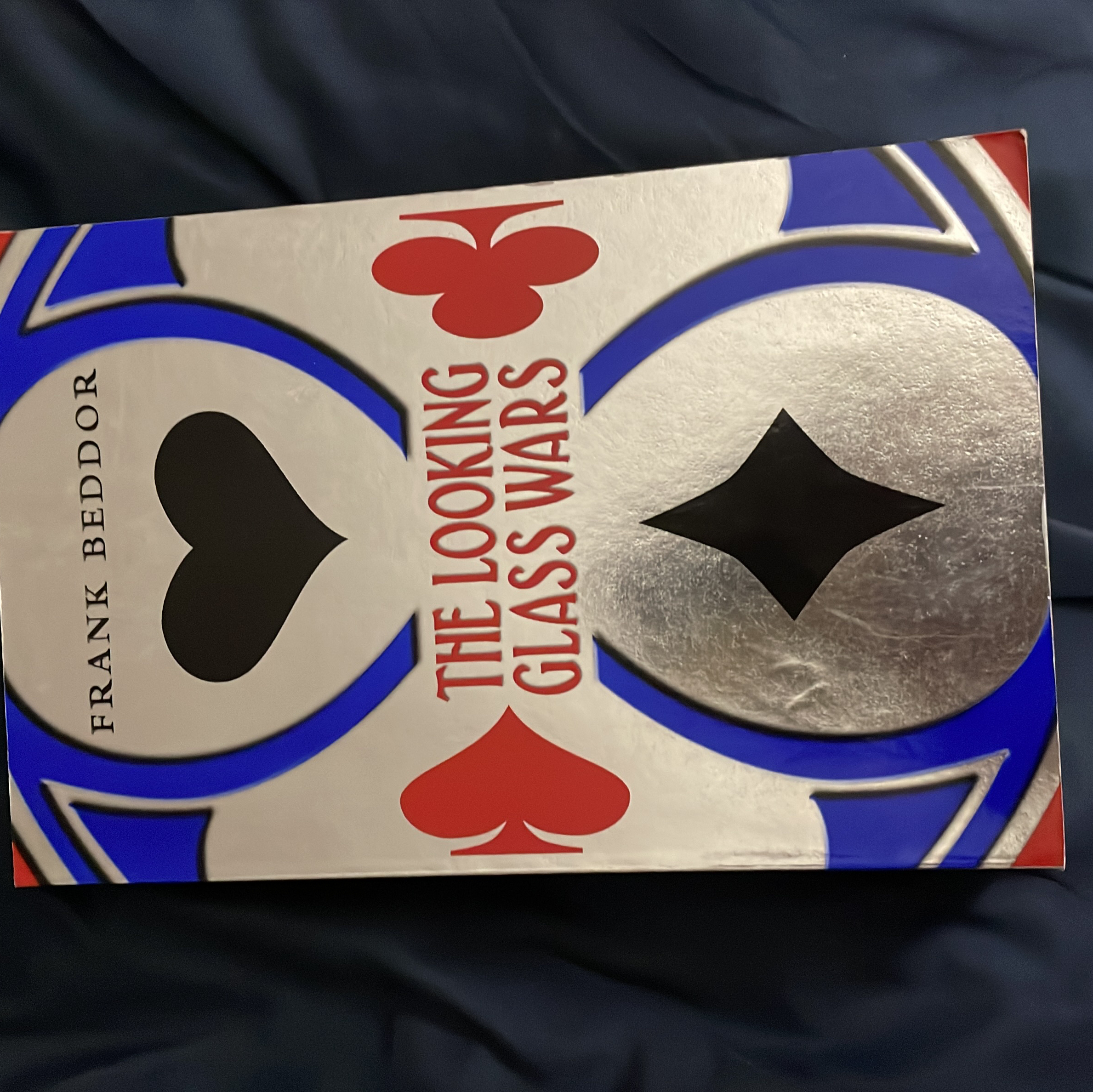 The Looking Glass Wars by Frank Beddor, Paperback | Pangobooks