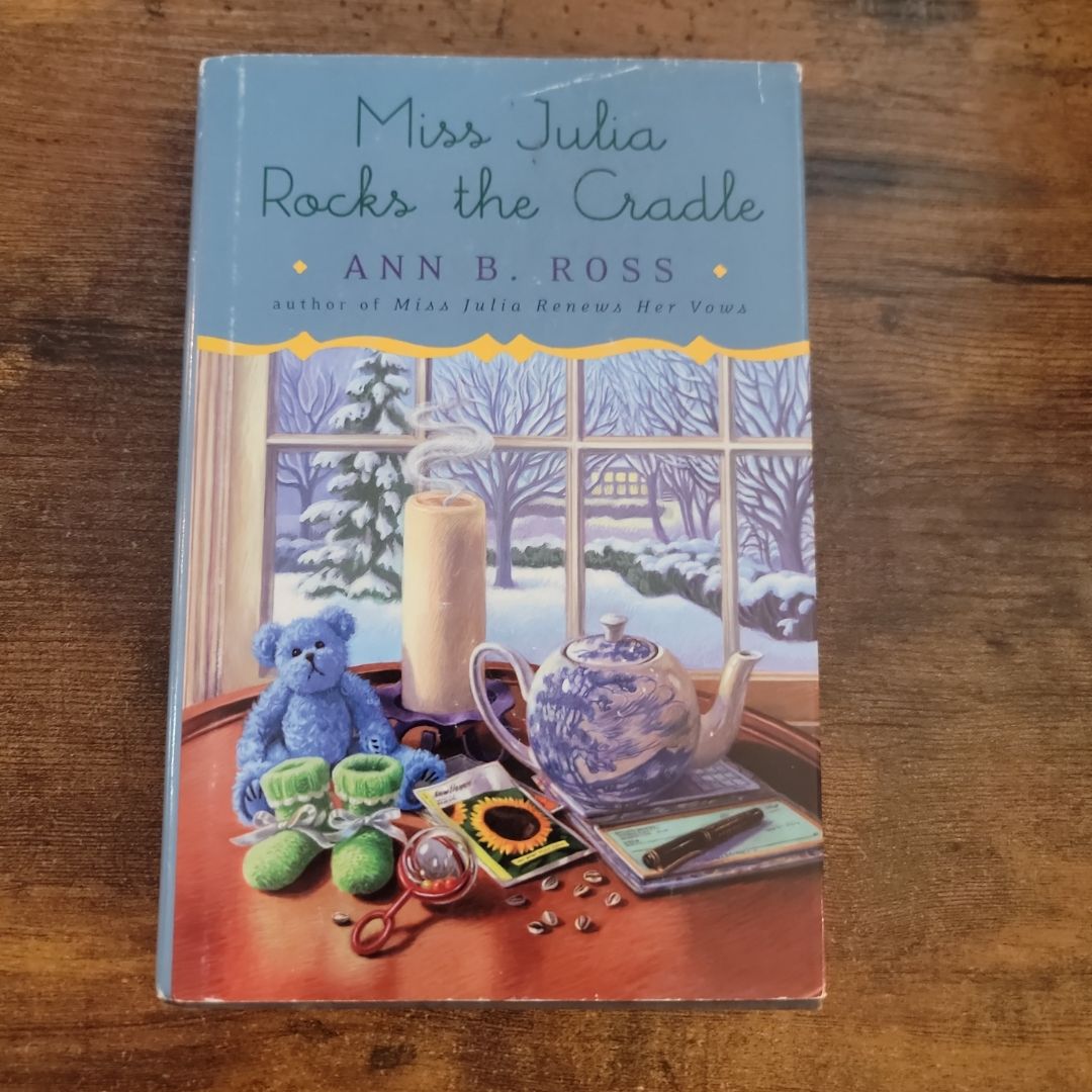 Miss Julia Rocks the Cradle