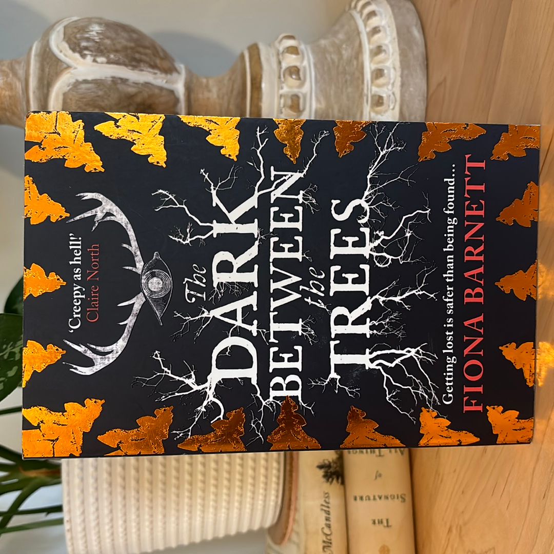 The Dark Between the Trees