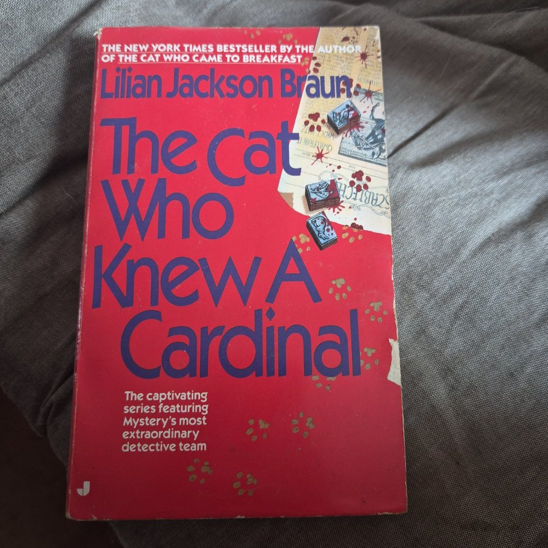 The Cat Who Knew a Cardinal