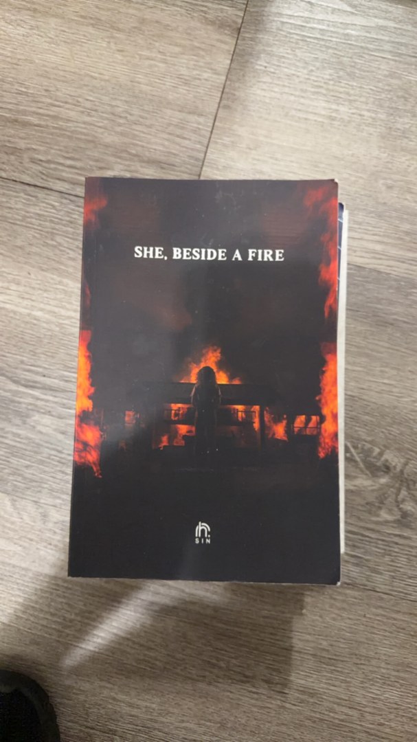 She, Beside a Fire