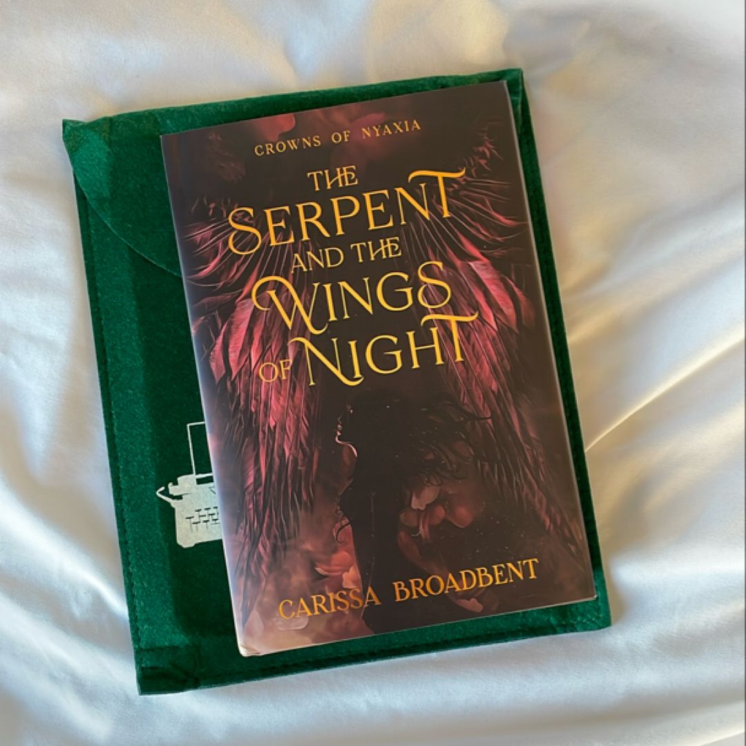 Book and glass. The Serpent and the Wings of Night