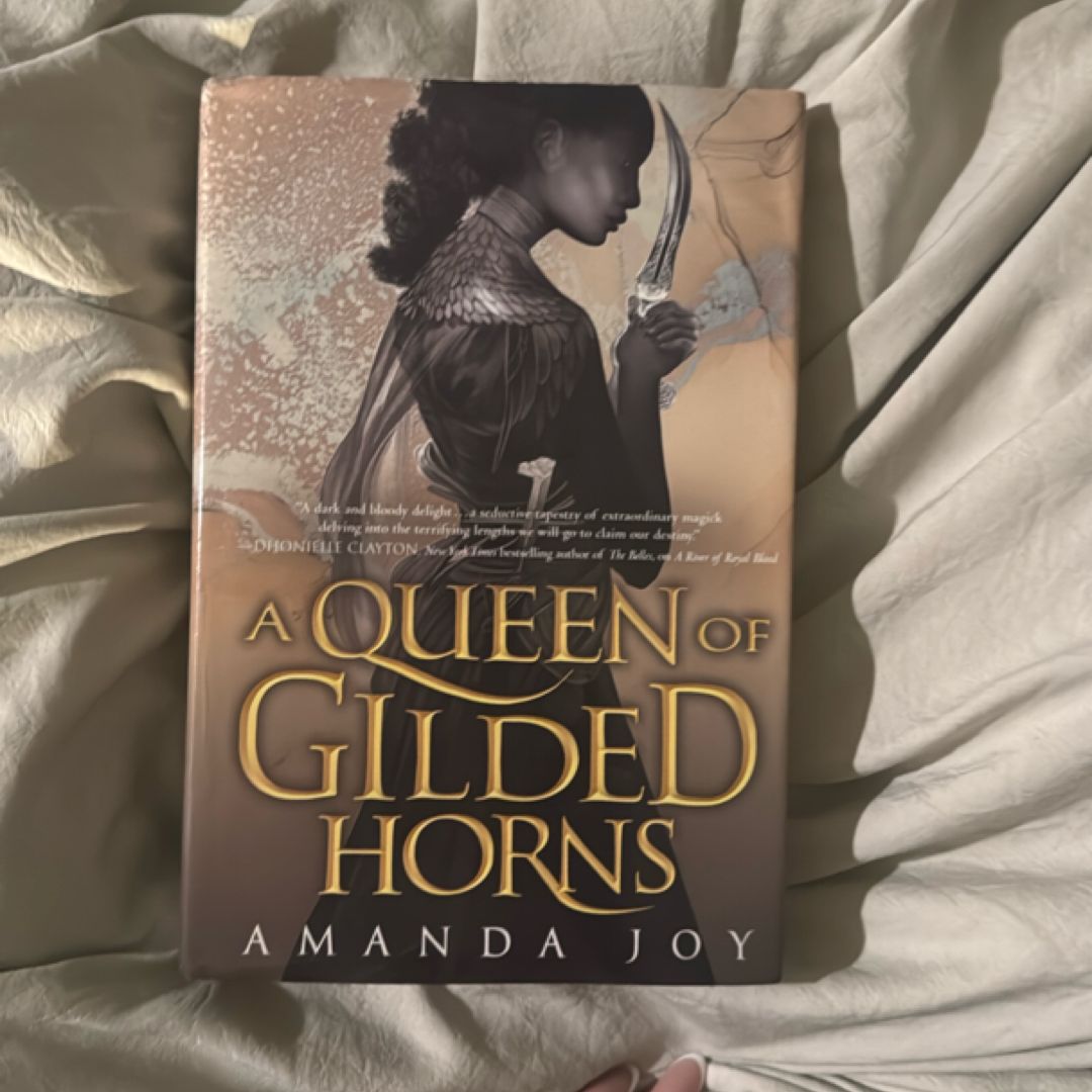 A Queen of Gilded Horns