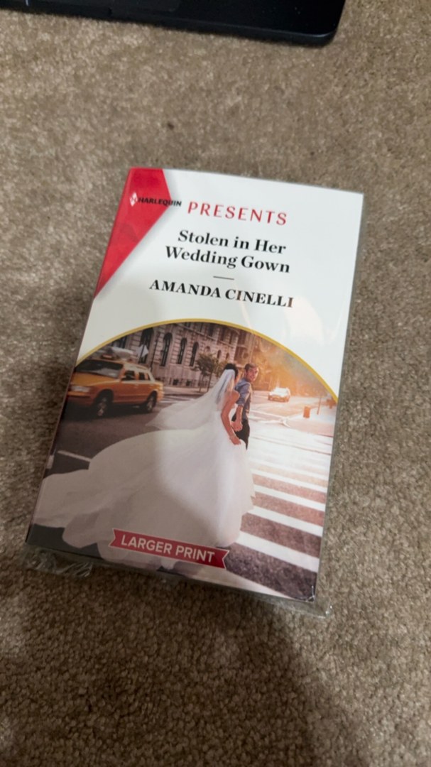 Stolen in Her Wedding Gown