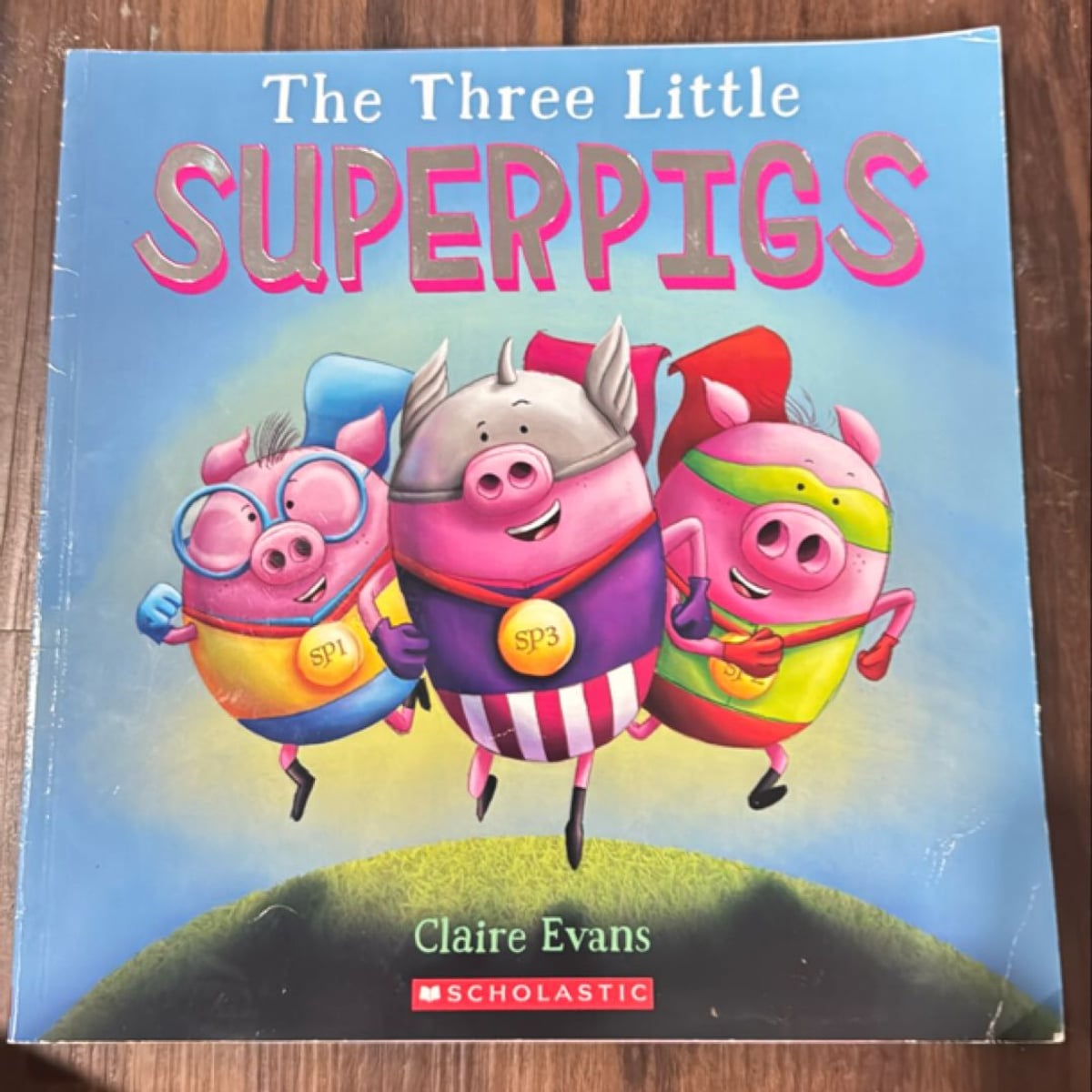 The Three Little Superpigs by Claire Evans