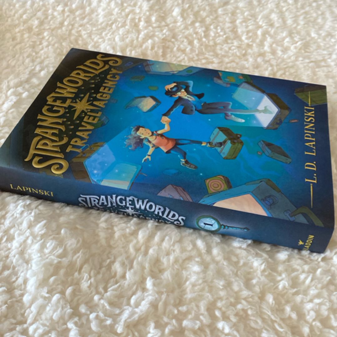 The Strangeworlds Travel Agency by L. D. Lapinski