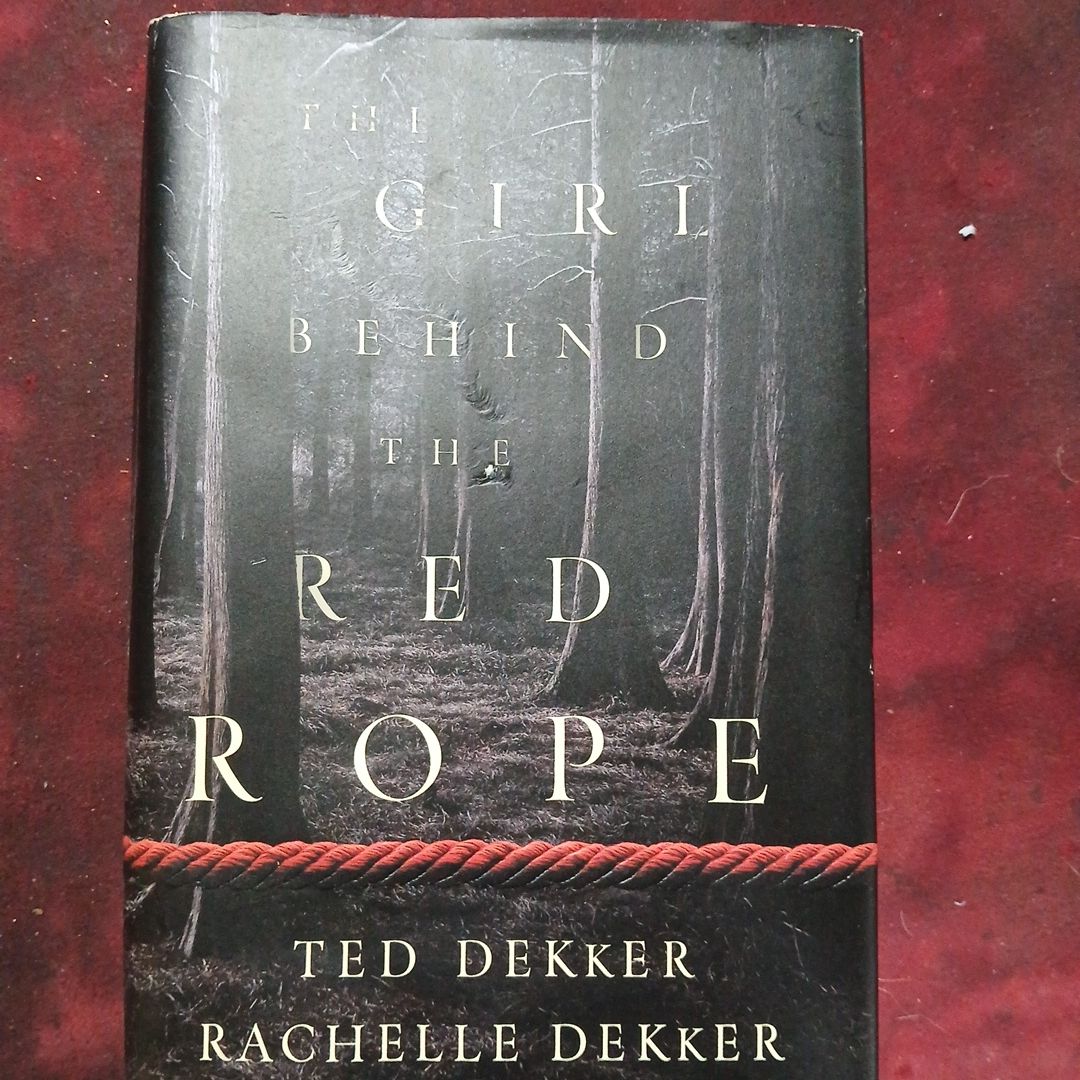 The Girl Behind the Red Rope