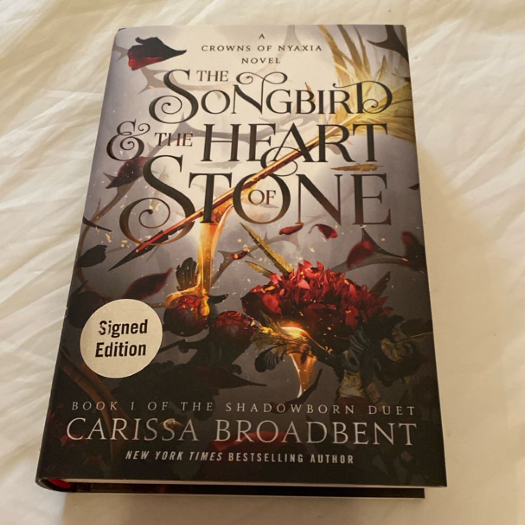 The Songbird and the Heart of Stone SIGNED