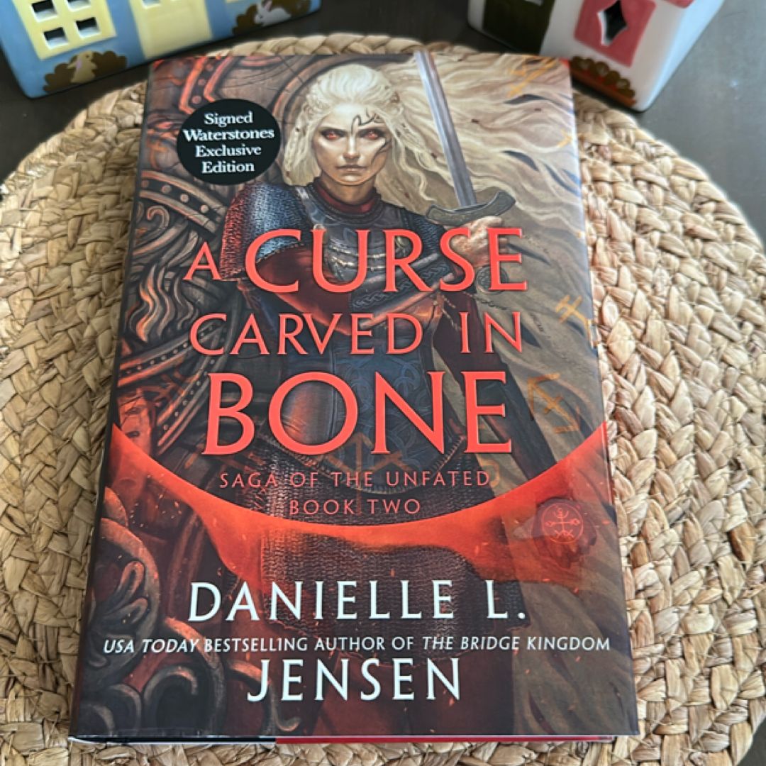 A Curse Carved in Bone (Waterstones)