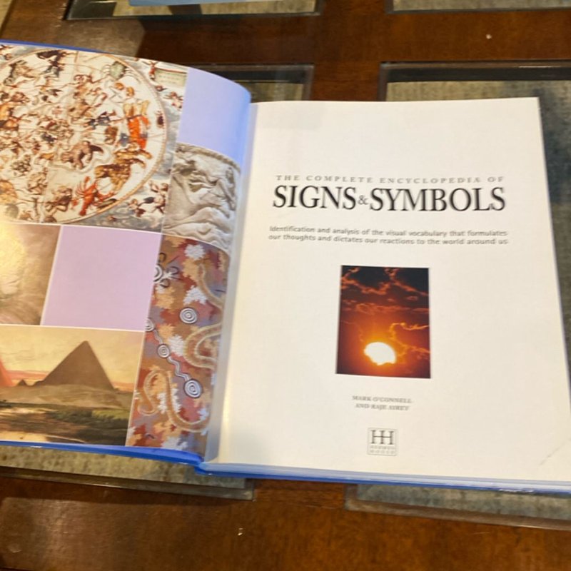 The Complete Encyclopedia of Signs and Symbols by Mark O'Connell