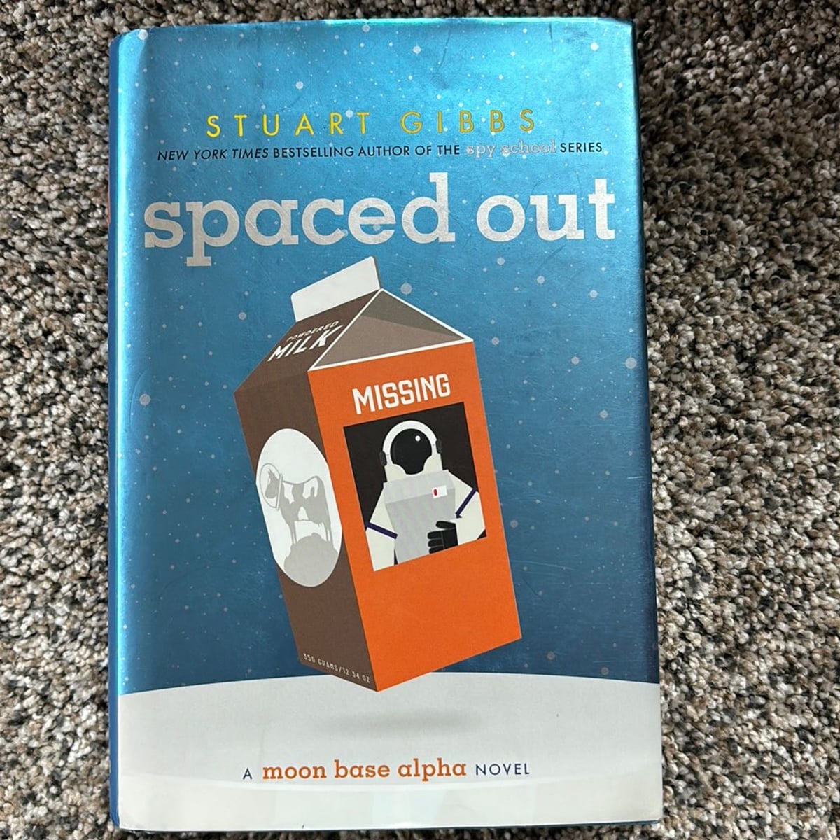 Spaced Out by Stuart Gibbs, Hardcover | Pangobooks