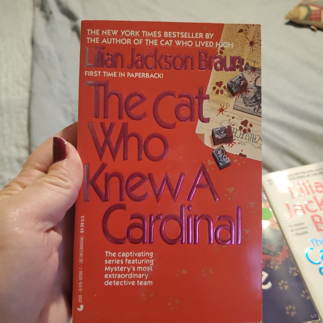 The Cat Who Knew a Cardinal