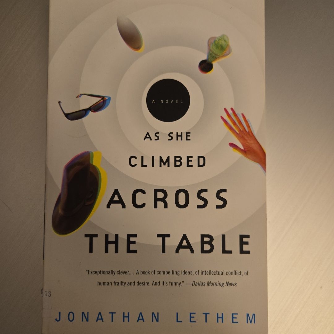 As She Climbed Across the Table