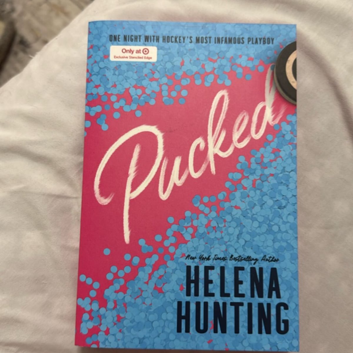 Pucked *target exclusive* by Helena Hunting, Paperback | Pangobooks