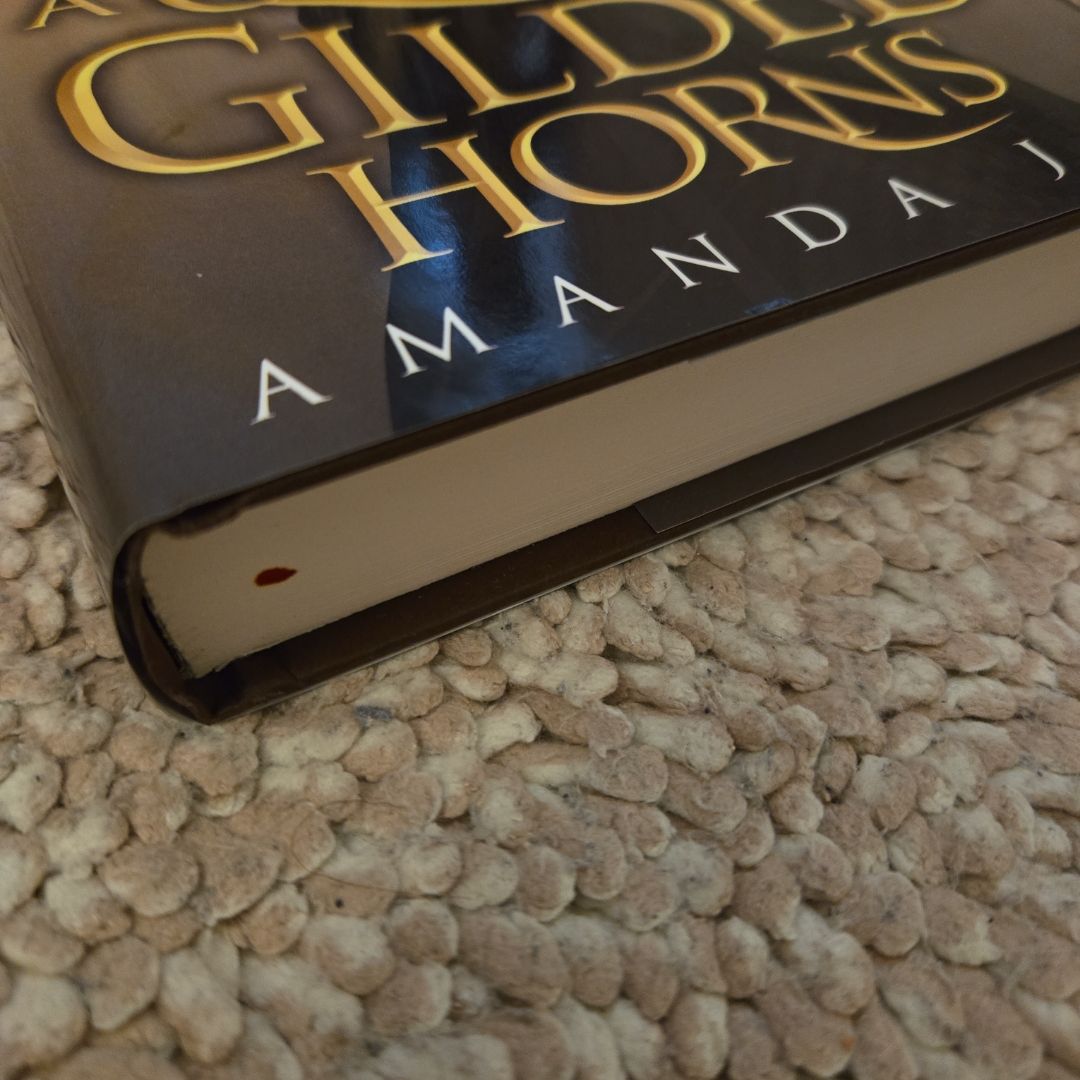 A Queen of Gilded Horns