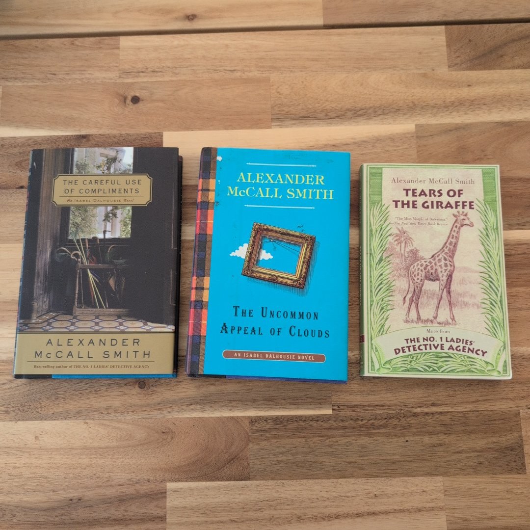 Lot of 3: The Careful Use of Compliments & The Uncommon Appeal of Clouds & Tears of the Giraffe 
