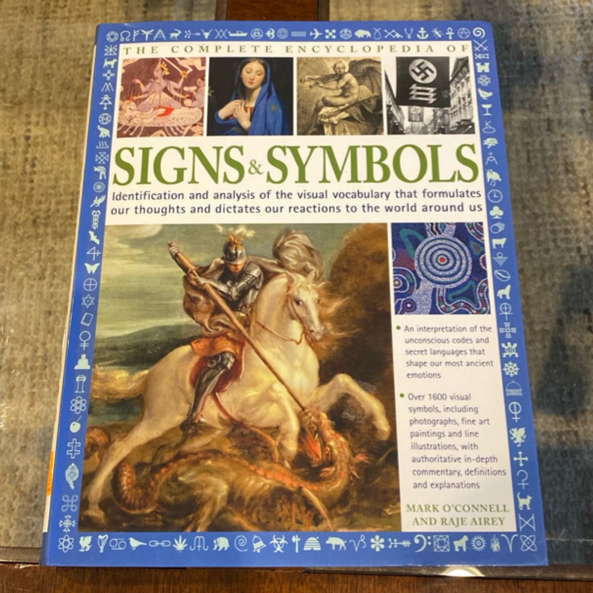 The Complete Encyclopedia of Signs and Symbols by Mark O'Connell