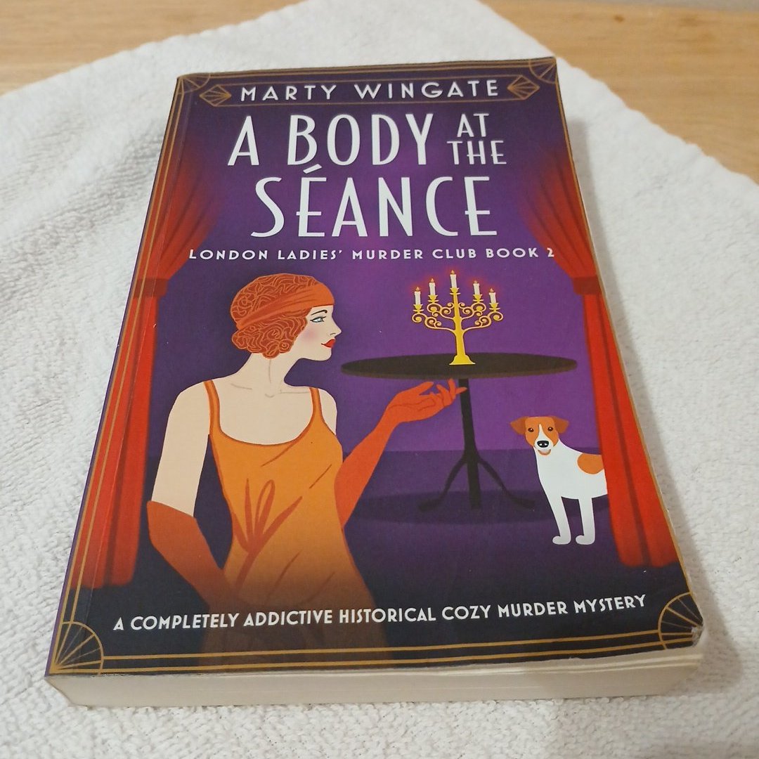 A Body at the Séance