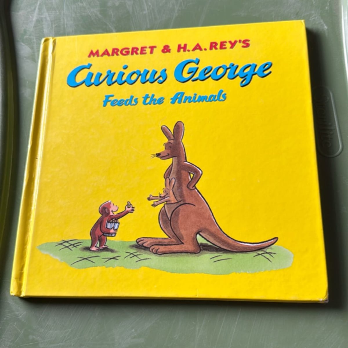 Curious George Feeds the Animals (8x8 with Stickers) by H. A. Rey ...