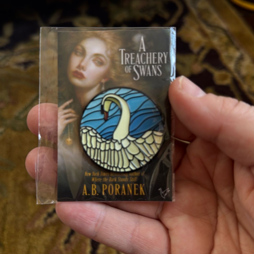 A treachery of swans enamel pin