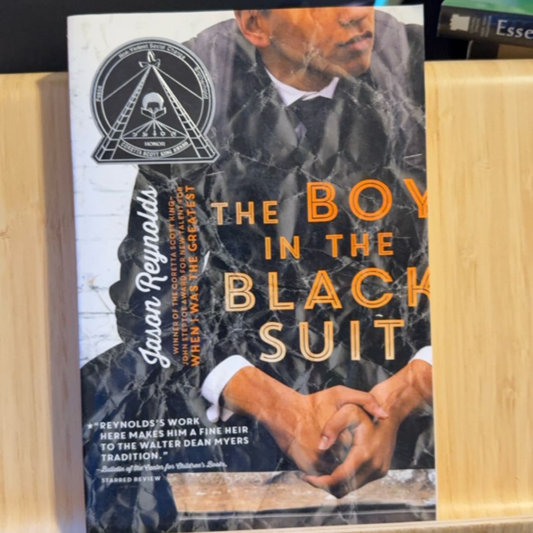 The Boy in the Black Suit