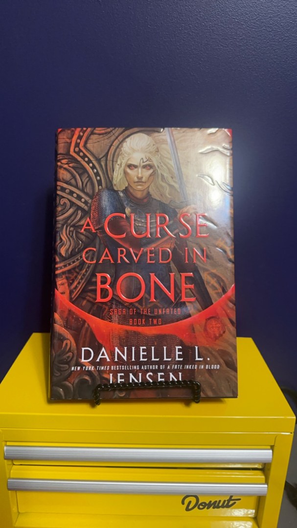 A Curse Carved in Bone