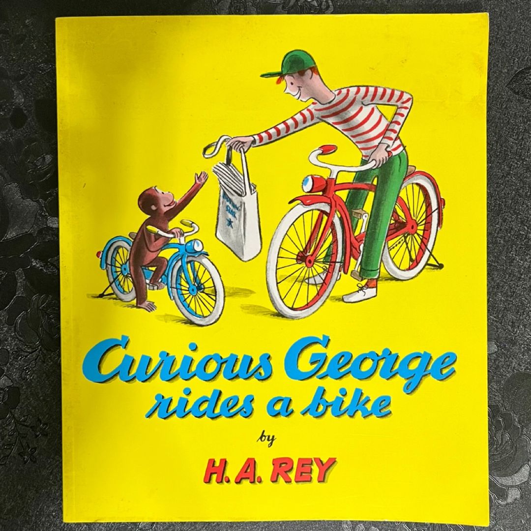 Curious George Rides a Bike