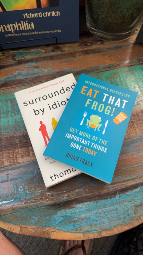 2 BOOKS: Surrounded by Idiots + Eat That Frog