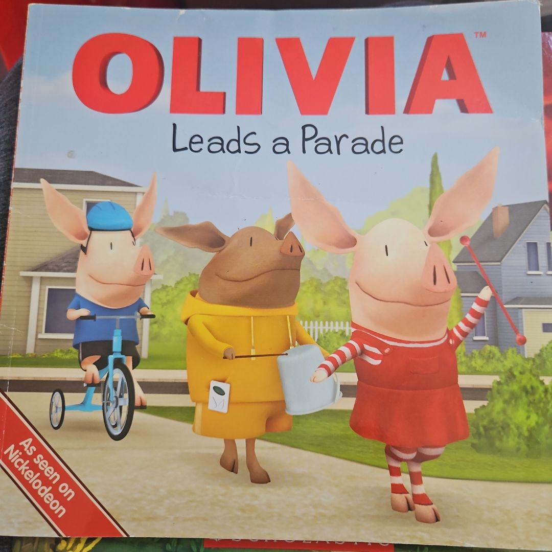 OLIVIA Leads a Parade