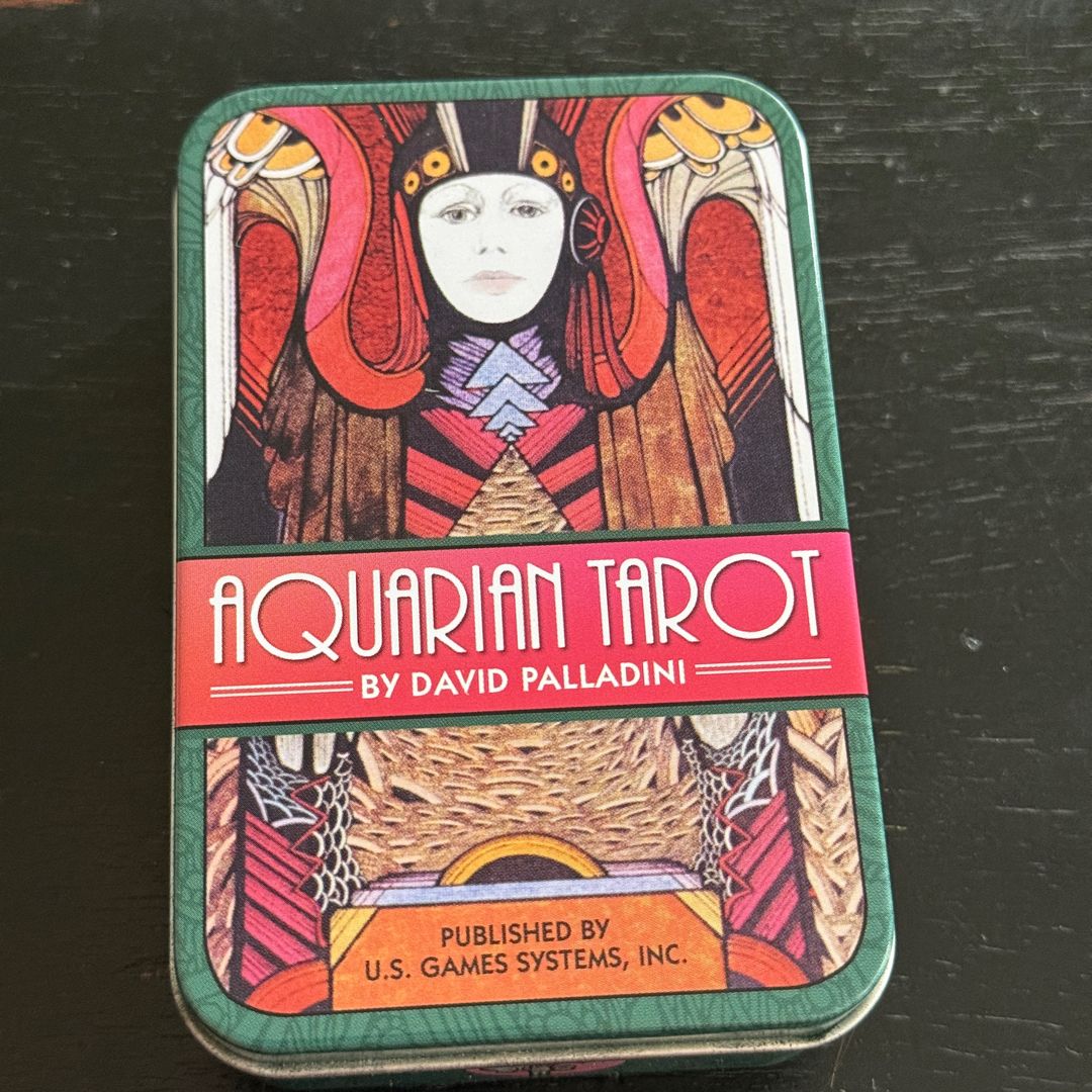 Aquarian Tarot card deck in tin