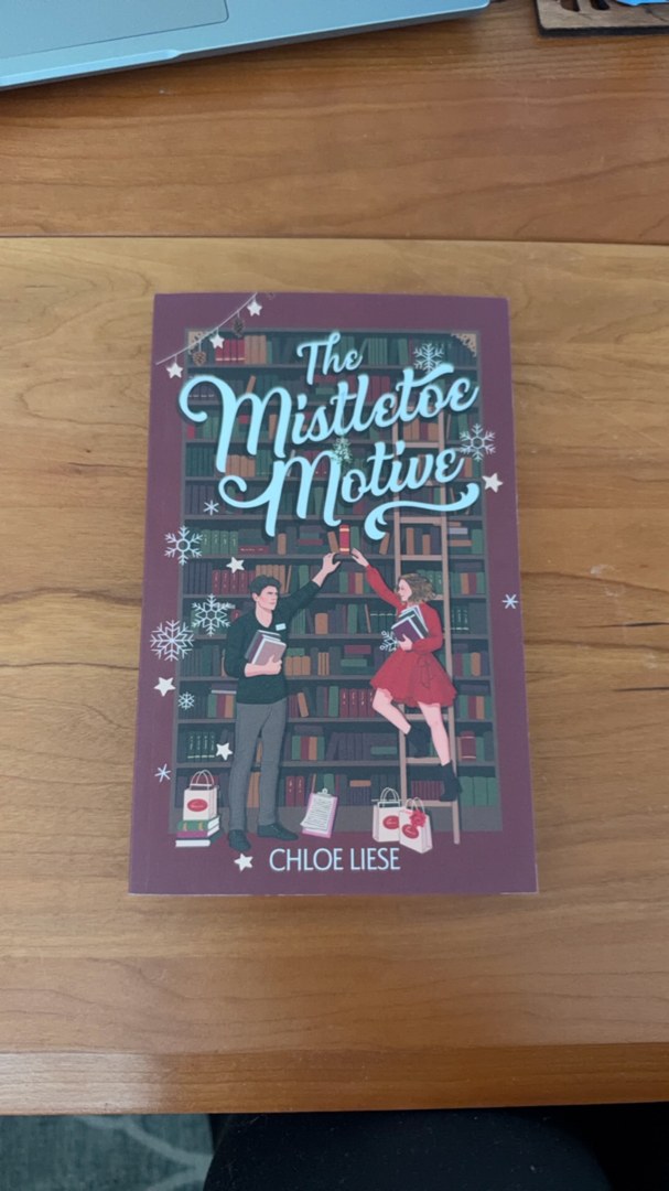 The Mistletoe Motive: A Holiday Novella