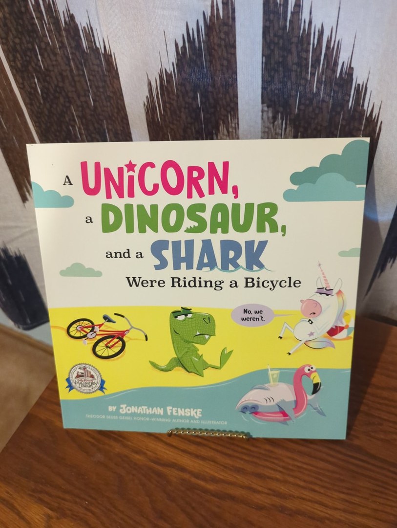 A Unicorn, a Dinosaur, and a Shark Were Riding a Bicycle
