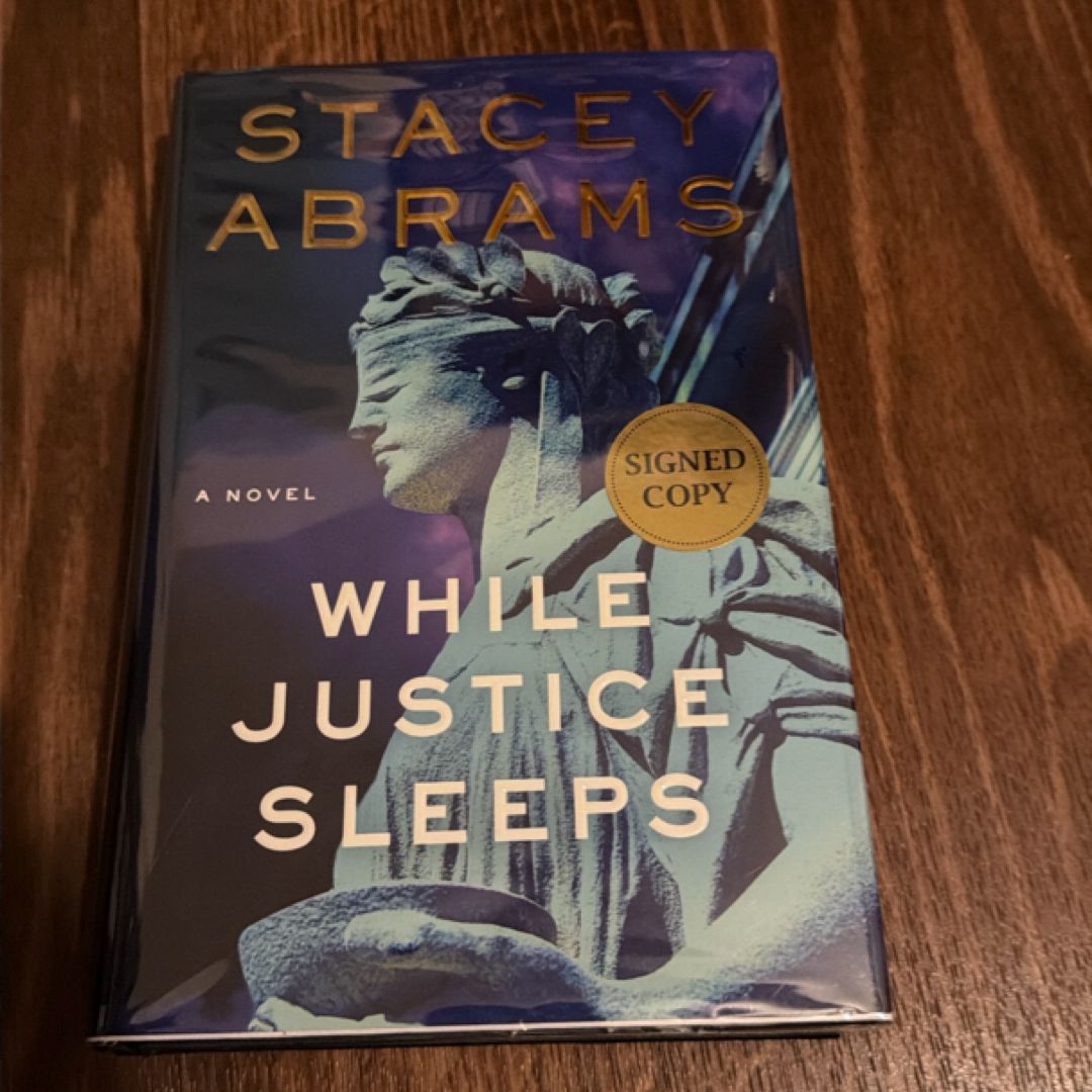While Justice Sleeps - Signed / Autographed Copy