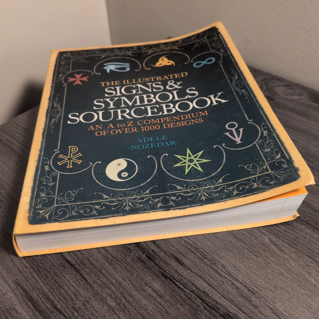The Illustrated Signs and Symbols Sourcebook by Adele Nozedar