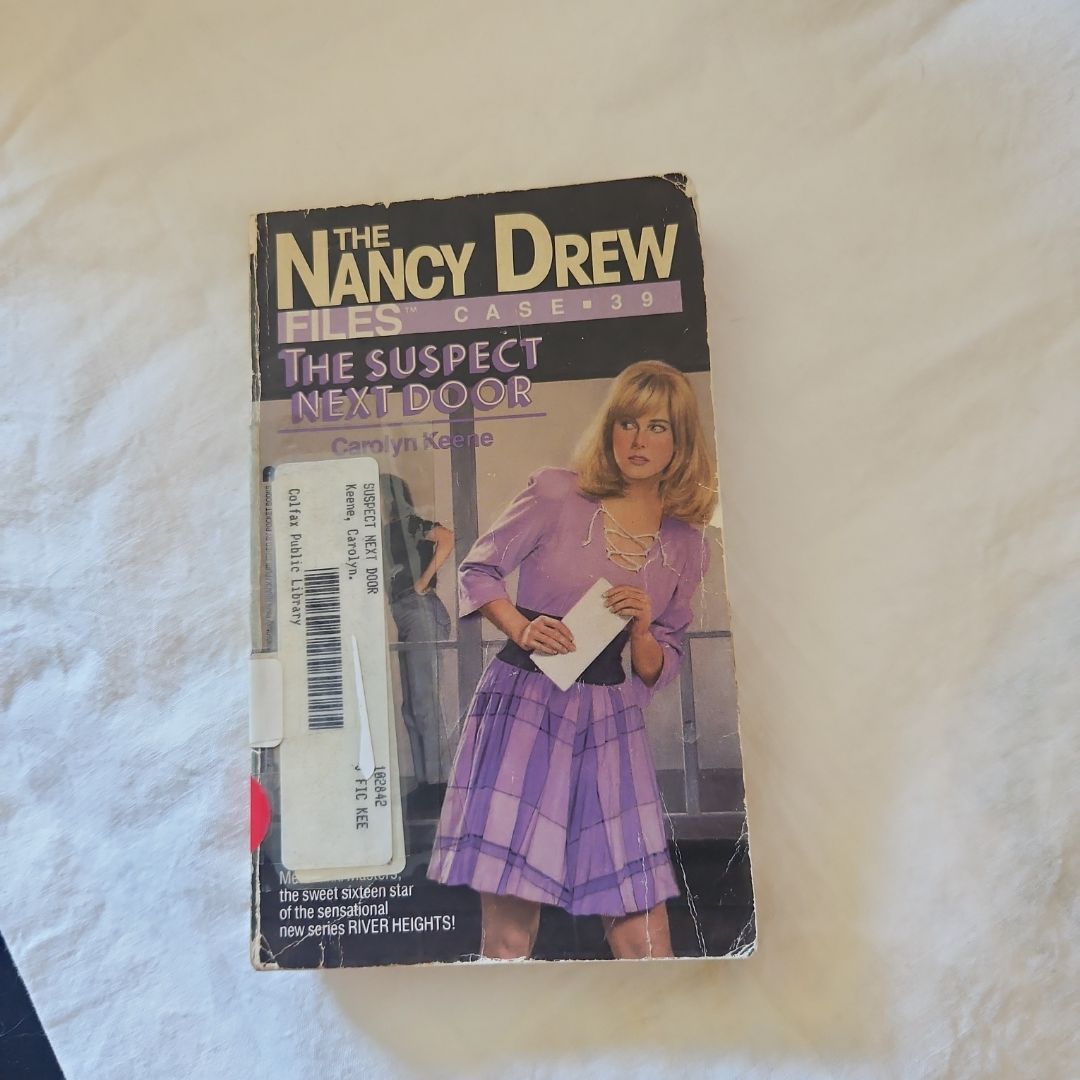 The Suspect Next Door