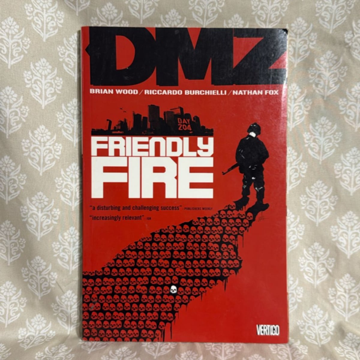 DMZ Vol. 4: Friendly Fire by Brian Wood; Riccardo Burcchielli ...