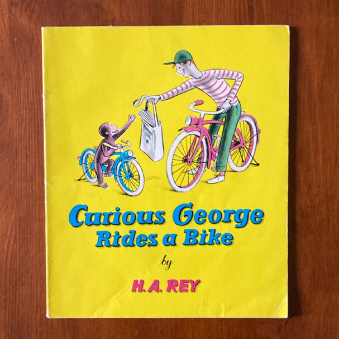 Curious George Rides a Bike