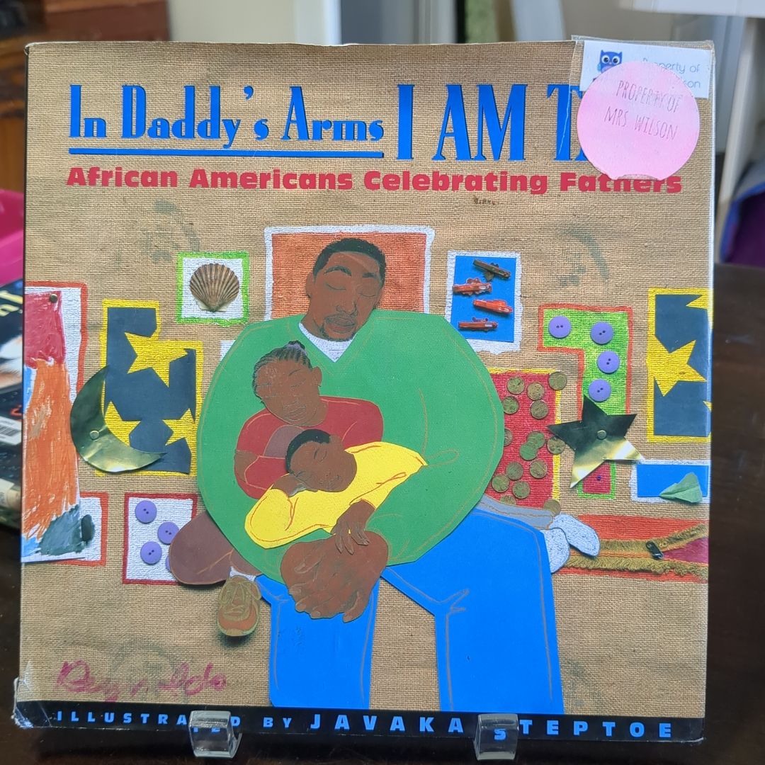In Daddy's Arms I Am Tall: African Americans Celebrating Fathers