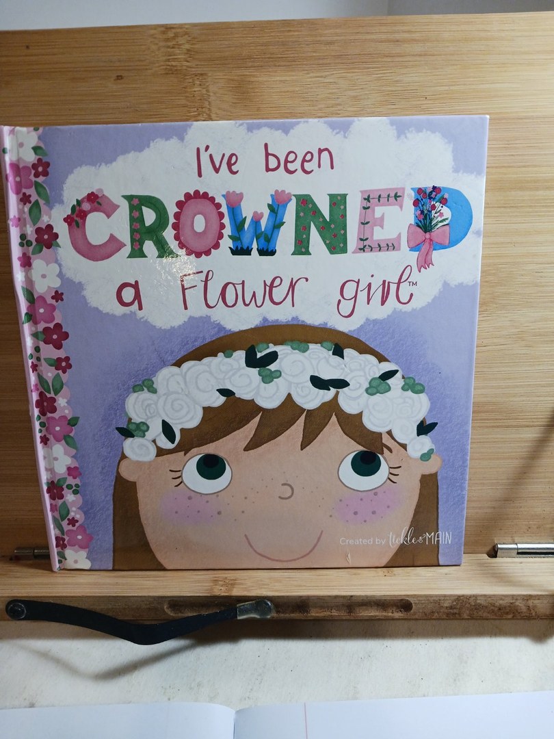 I've been crowned a flower girl. P169