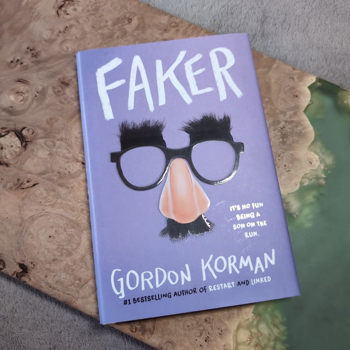 Faker by Gordon Korman
