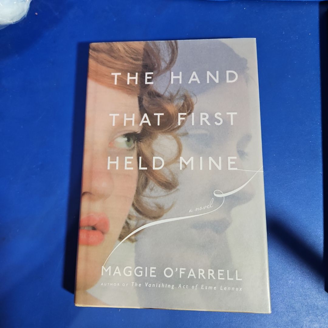 The Hand That First Held Mine
