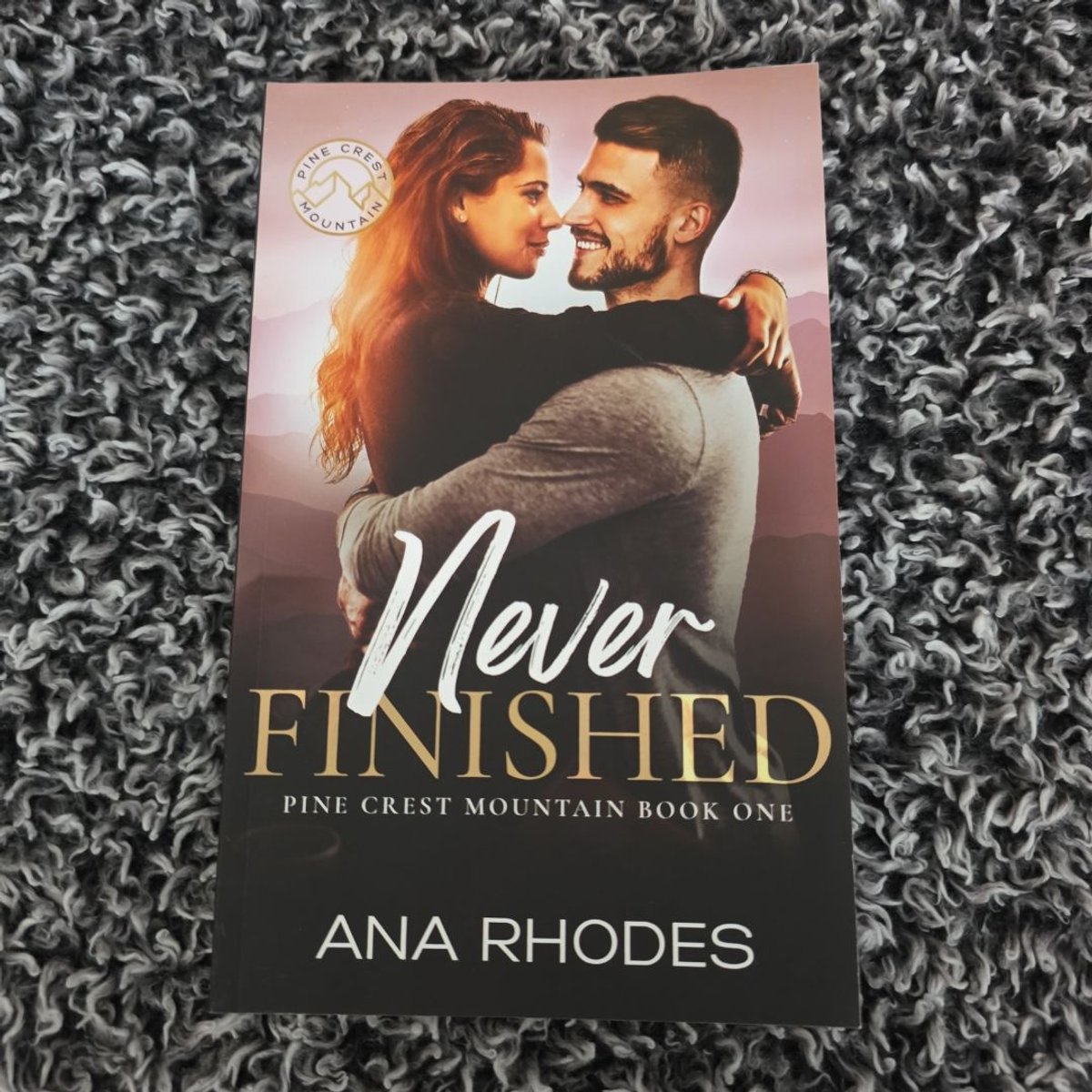 Never Finished by Ana Rhodes